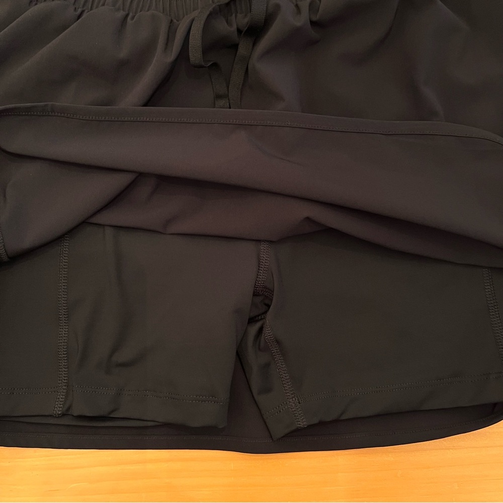 NWT Beyond Yoga In Stride Lined Skirt Stretch Woven XS Black Built-In Shorts $88 - Picture 10 of 15